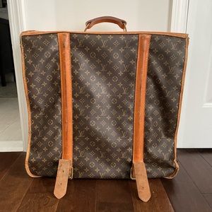 Authentic vintage Louis Vuitton garment bag.